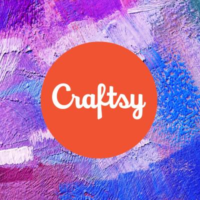 A digital image with a colorful background of paint brush strokes blending together in blue, purple, pink, and white. At the center of the image is an orange circle with the text, "Craftsy."