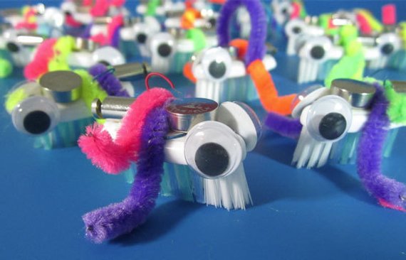 bristle bot with googly eyes and pipe cleaner arms