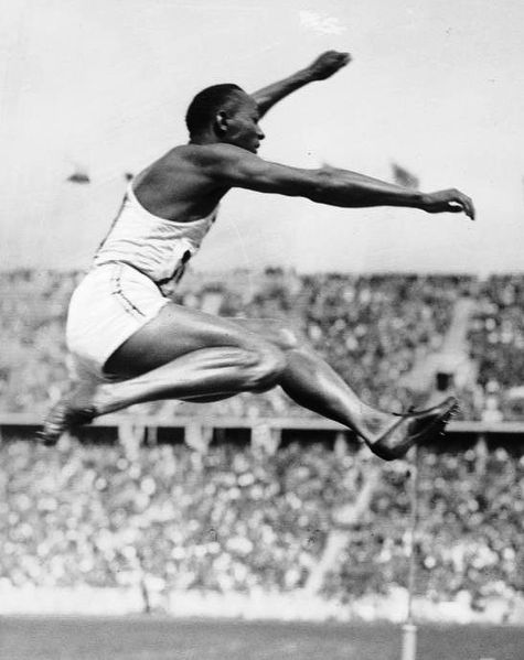 Image of Jesse Owens at the 1936 Olympic Games, broad jumping