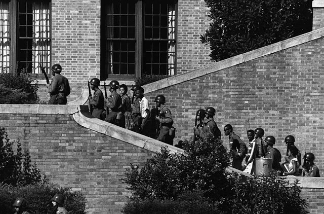 Little Rock Nine being escorted into Central High by 101st Airborne