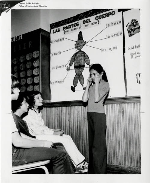 Photograph of an unidentified student participating in a bilingual class. at Del Pueblo Elementary School in Denver, Colorado.  