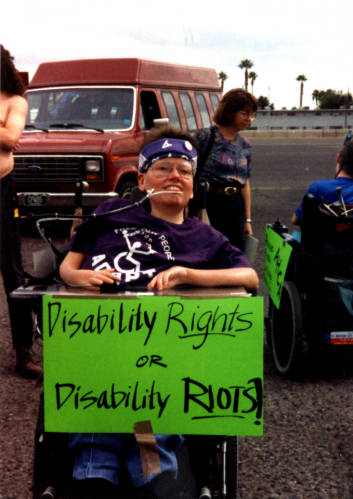 Laura Hershey participating in the ADAPT protest against the American Health Care Association's 1994 Las Vegas Convention