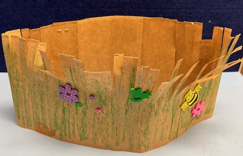 Photo of Grass and insect paper bad headband craft