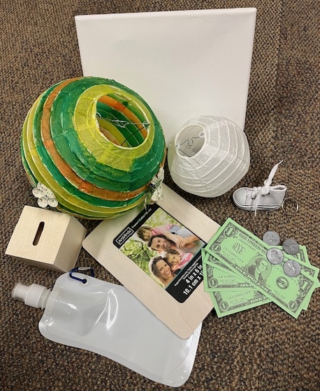 Items the kids can decorate at our arts and crafts shop include wooden banks and frames, paper lanterns, collapsible water bottle, sneaker key chain and more!