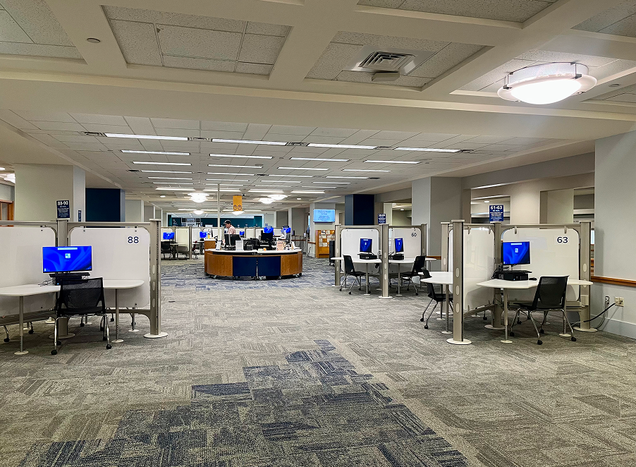 View of Central’s 4th floor Computer & Technology Center. Information desk and computer pods