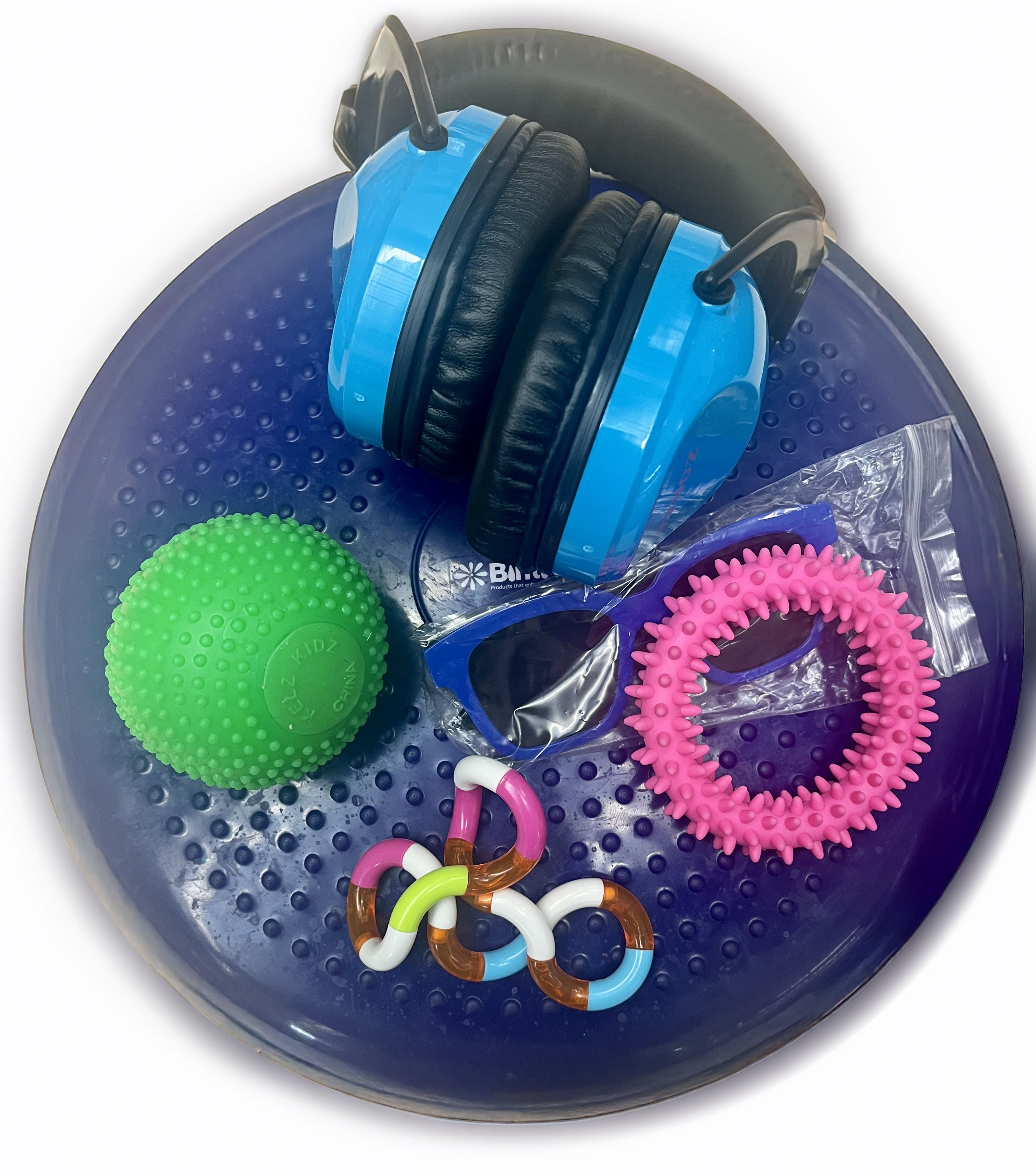 Sensory toolkit include: Wiggle seats, Sunglasses, Variety of fidgets, and Ear protection.