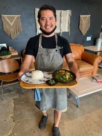 Co-owner of Urban Burma-Siri Tan serving our CI committee member some yumminess