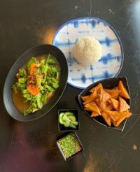 Stir Fried Veggies w/ Steam Rice, Golden Triangle Tofu w/ a side of Tamarind sauce.
