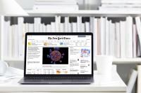 An image of the New York Times website on the screen of an open laptop.