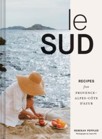 cover of le sud depicting woman on the beach