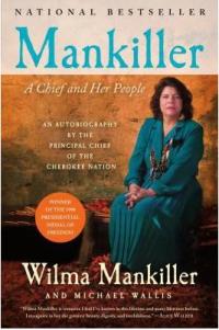 Wilma Mankiller sitting with hands on lap