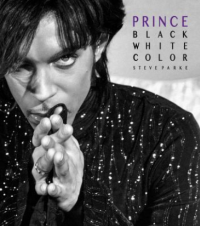 black and white photo of prince staring into the camera