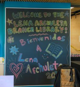 Chalk art welcomes the community to the new Lena Archuleta Branch Library.